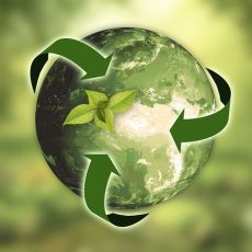 earth with recycling arrows vector