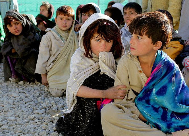 Young children in Afghanistan, scared and huddled together