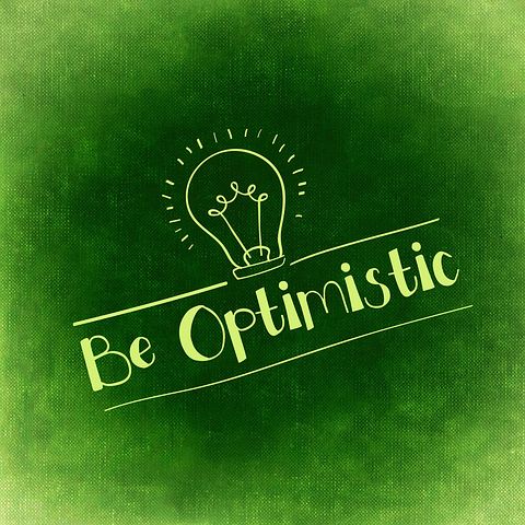 "Be Optimistic" written under a light bulb on green background