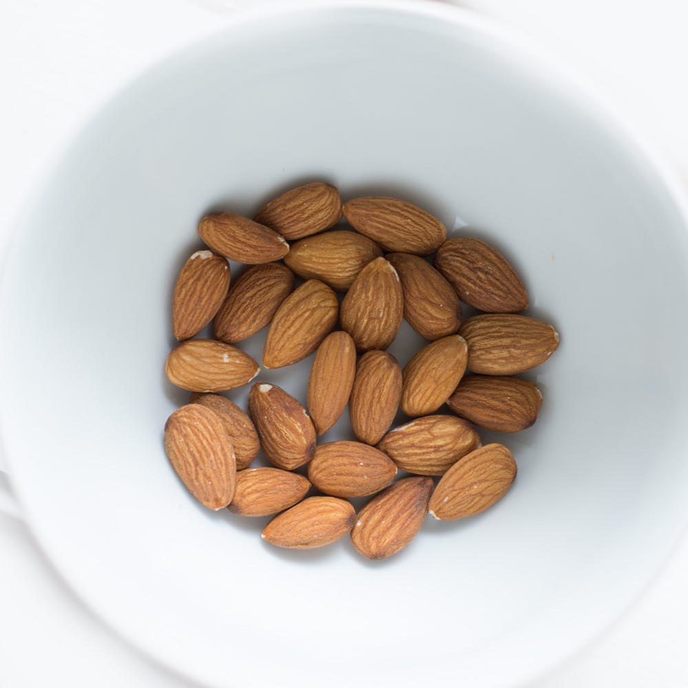 Almond nuts in white dish