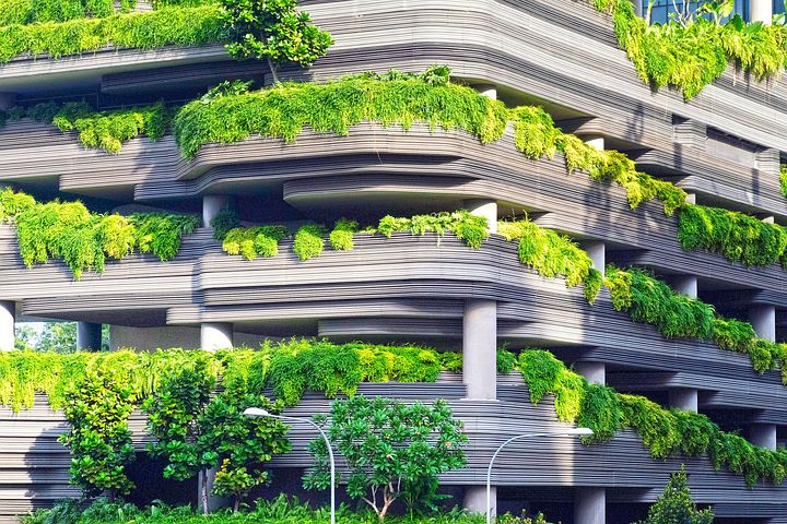 Building with lots of greenery built into walls