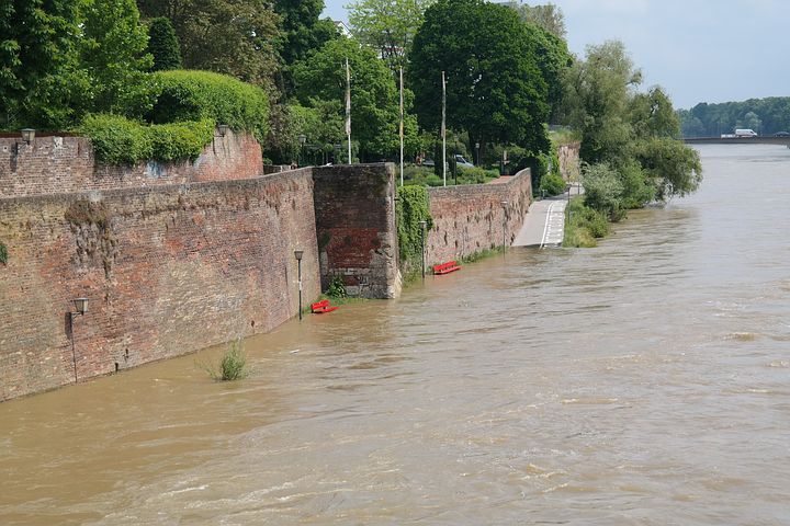 flood waters held back by a high wall