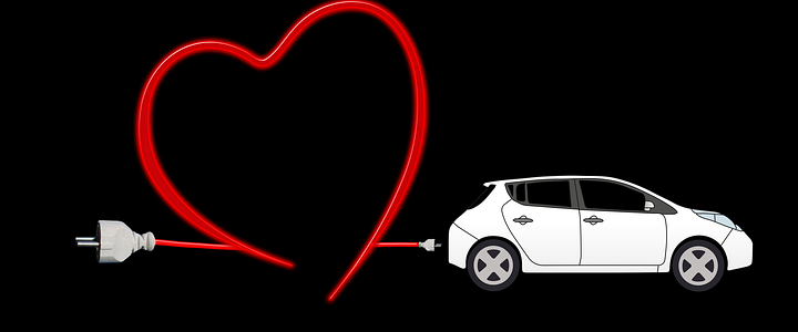 Electric vehicle being charged with love heart in the cable