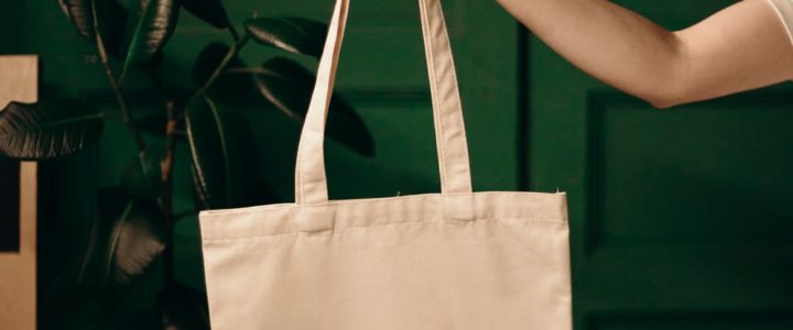 Woman holding reusable shopping bag