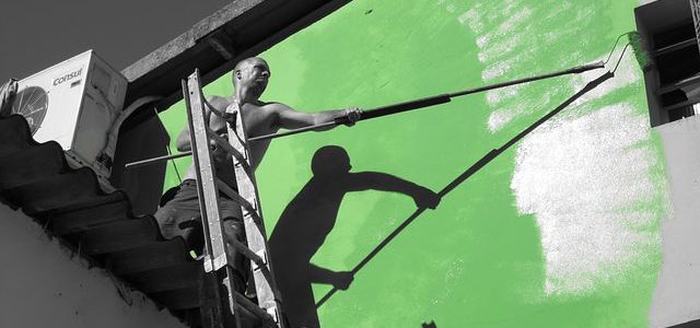 Main painting a billboard green