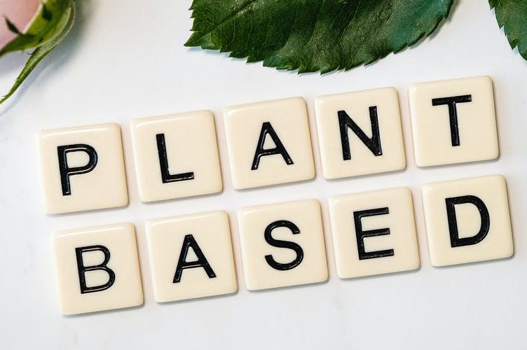 Plant based spelled out in Scrabble tiles