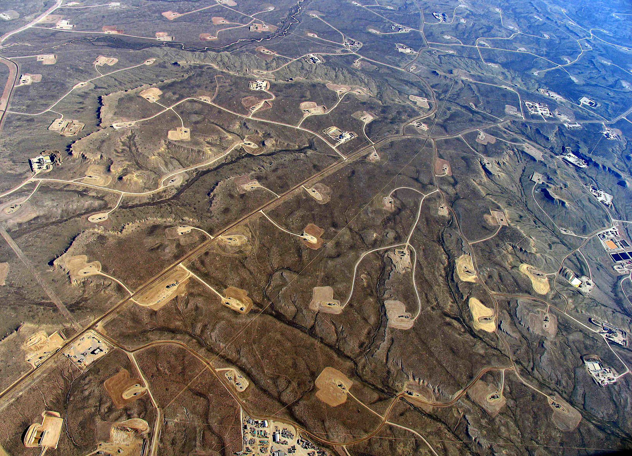 A heavily fracked area, with a dense web of roads, pipelines and well pads,  turning continuous forests and grasslands into fragmented islands.